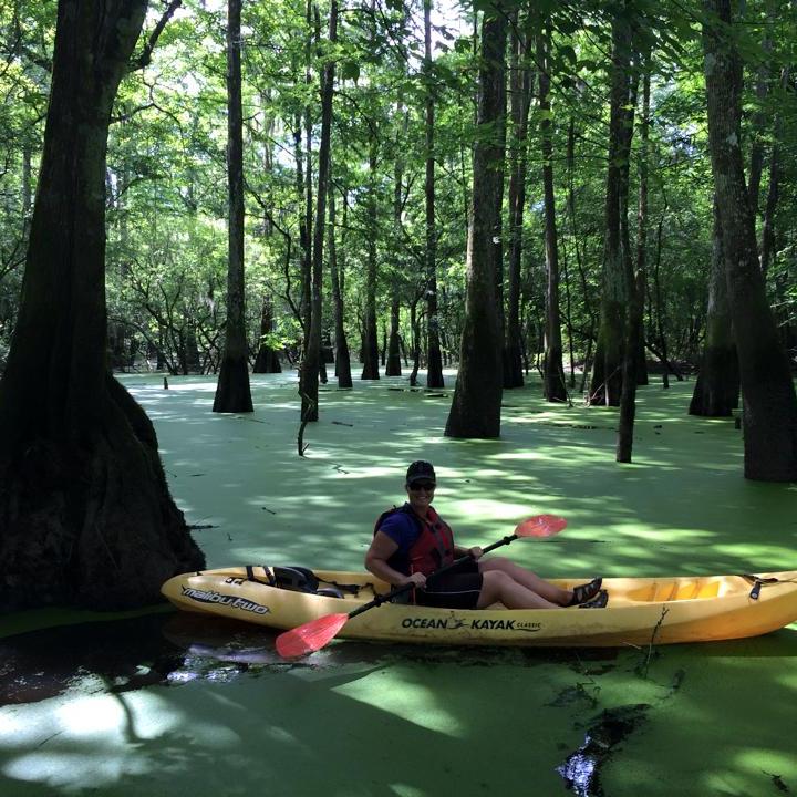 woman in kayak in New Orleans swamp