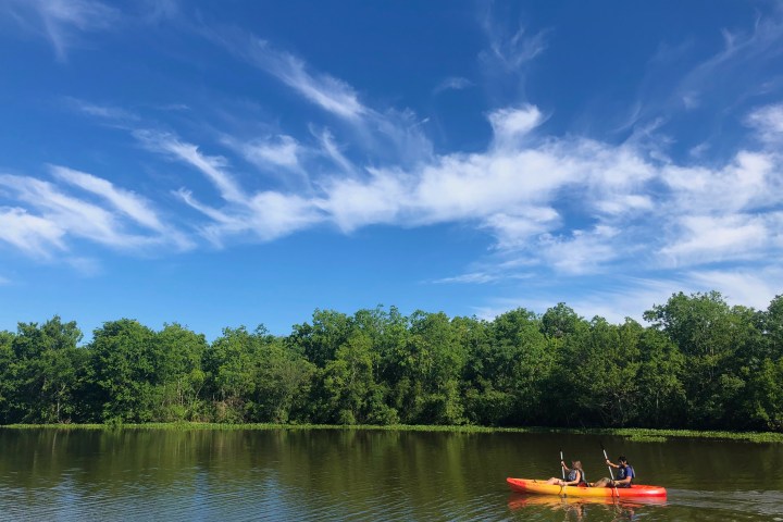 a small boat in a body of water